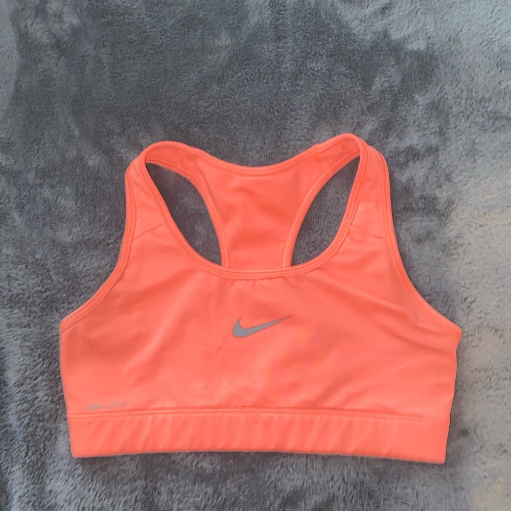 Neon coral Nike sports bra